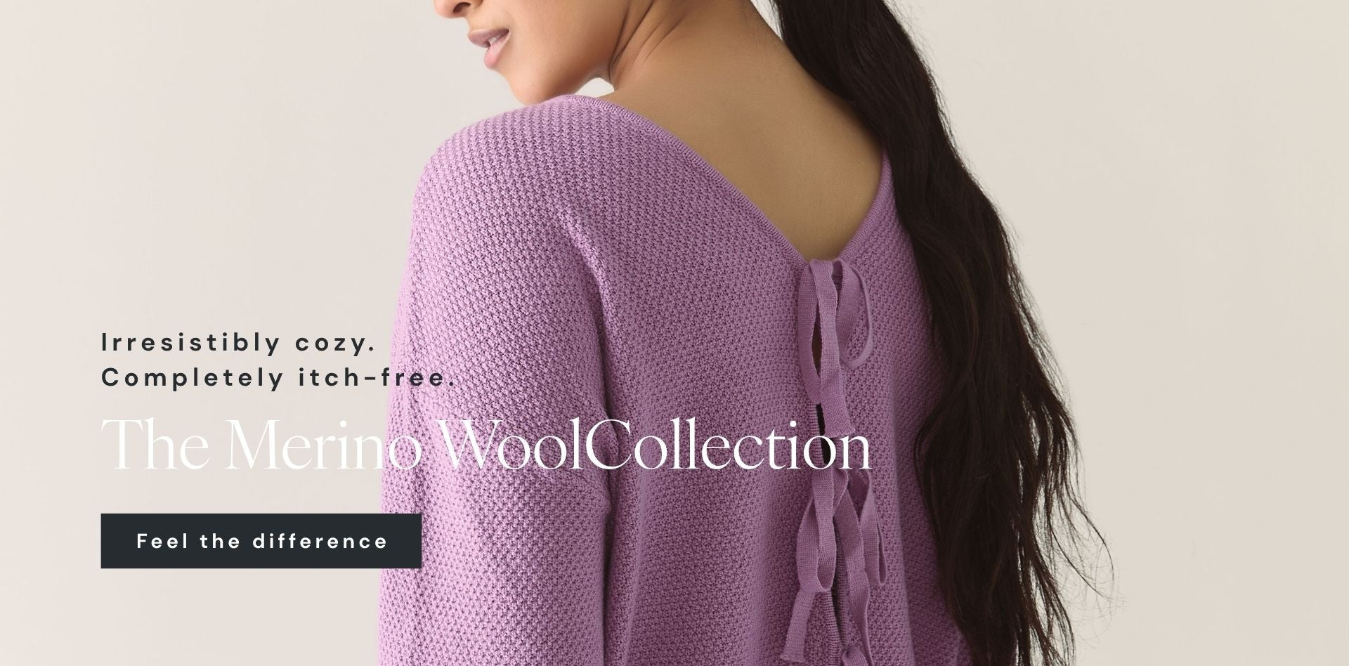 Woman wearing a purple lilac sweater with text about Merino Wool Collection