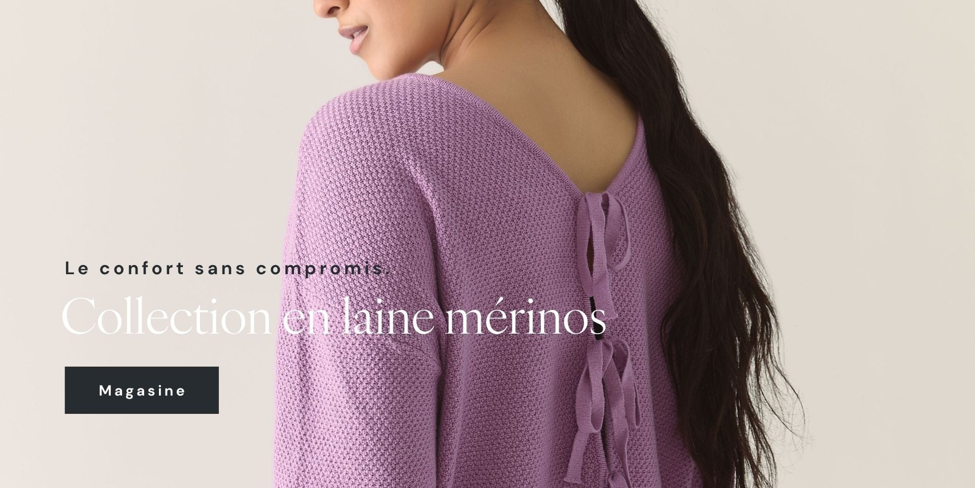 Woman wearing a purple lilac sweater with lace-up