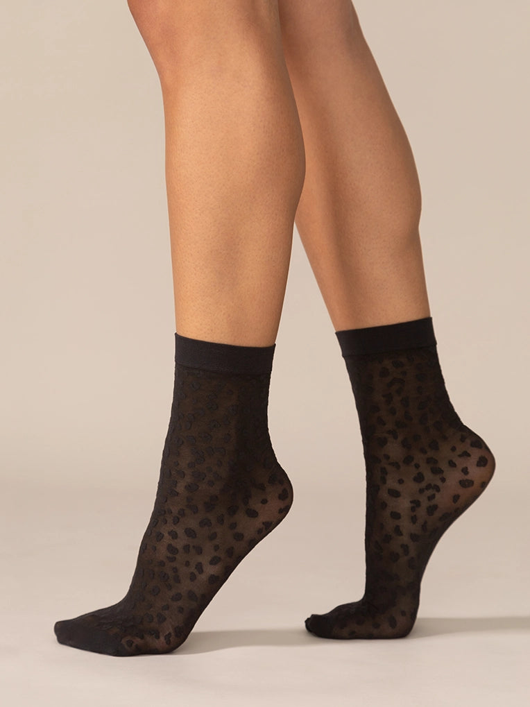 Chaussettes diaphanes motif mini léopard - Noir