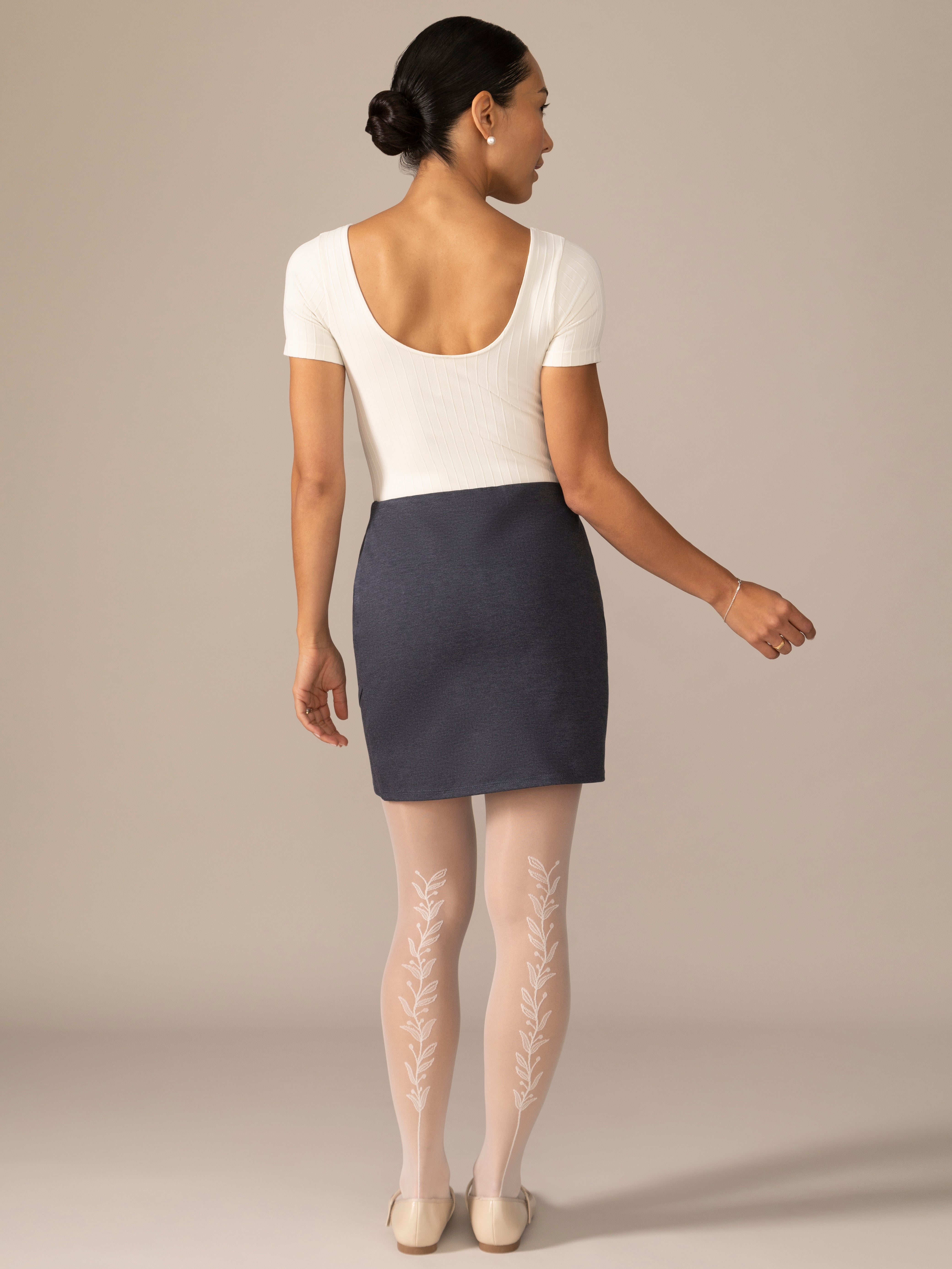 Mini fitted skirt with tulip front shape in Heather Lake