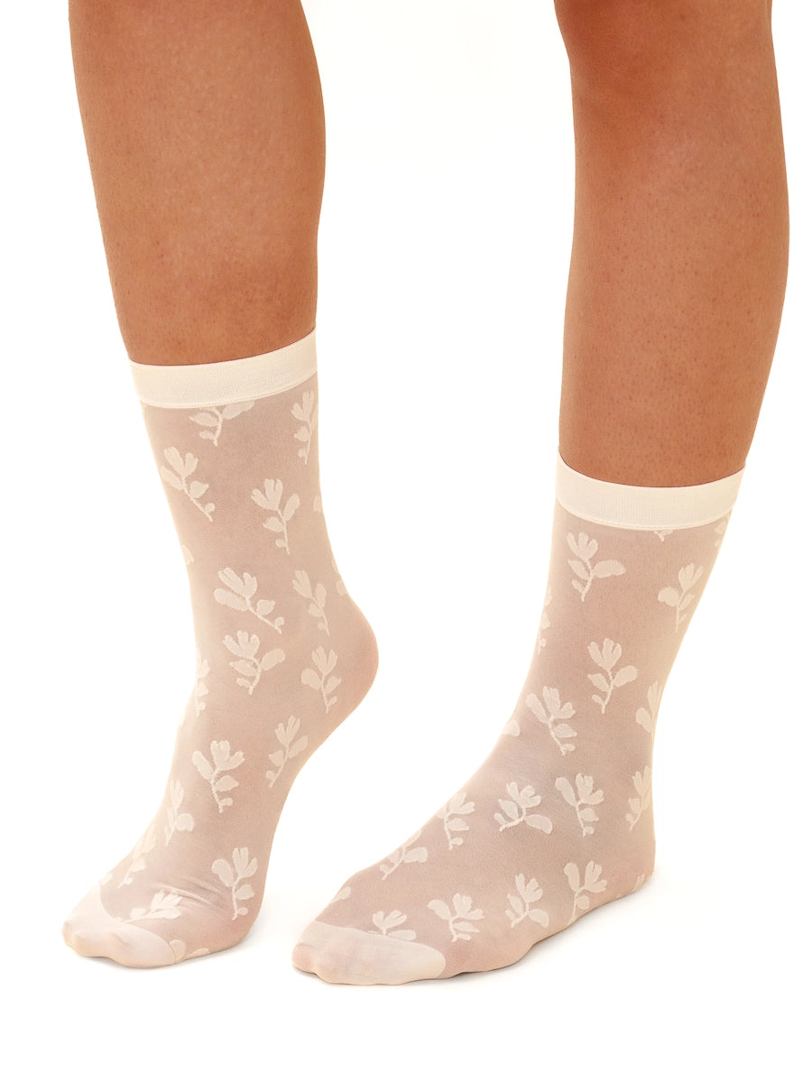 Chaussettes diaphanes florales en Blanc crème