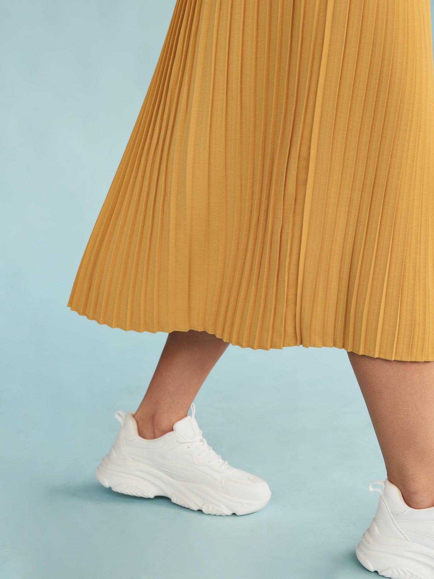 Women's yellow pleated skirt