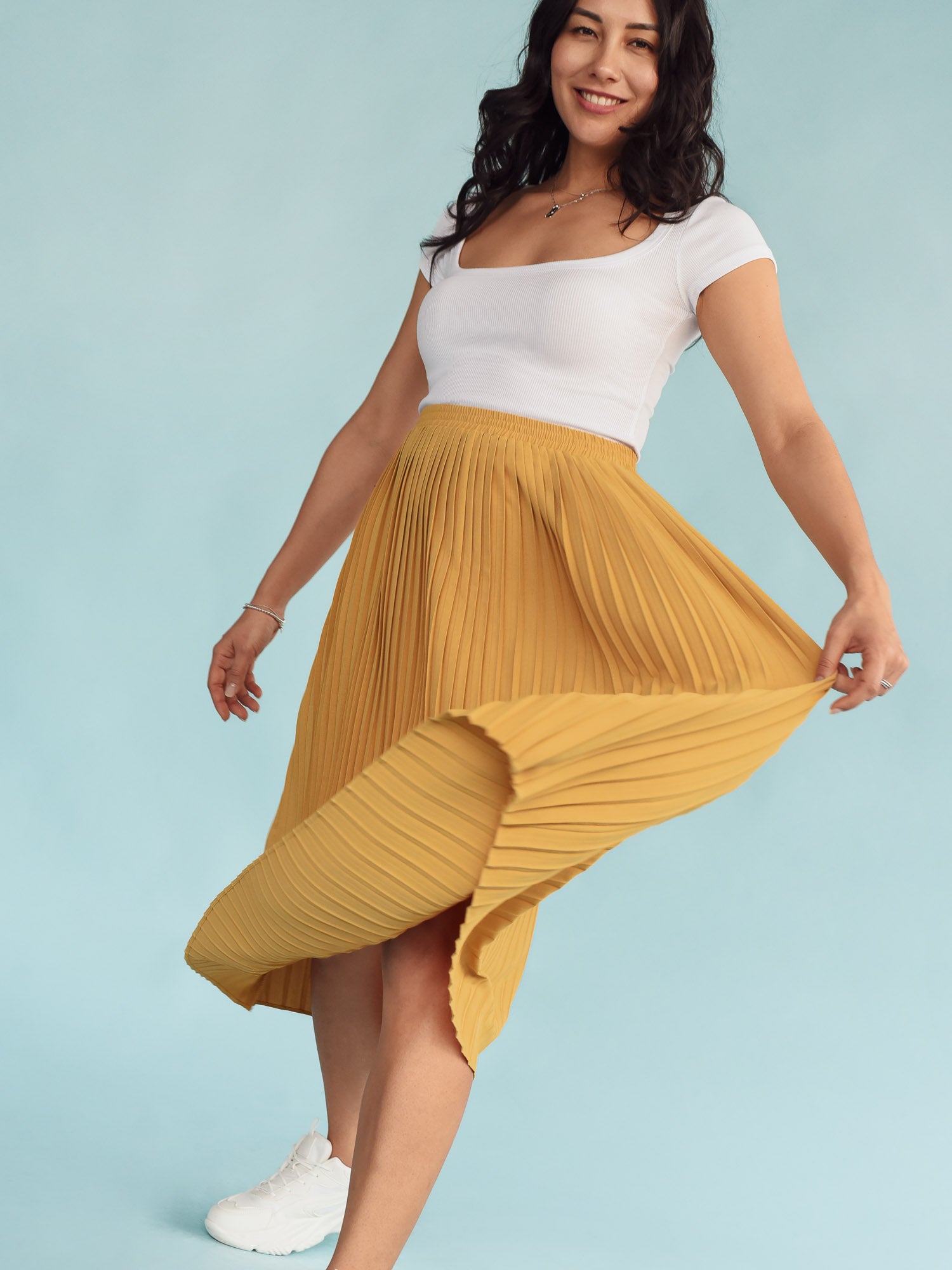 Women's yellow pleated skirt